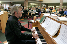 Church of Scotland minister John Bell introduced hymns from the Iona Community during lectures at Calvin Theological Seminary.